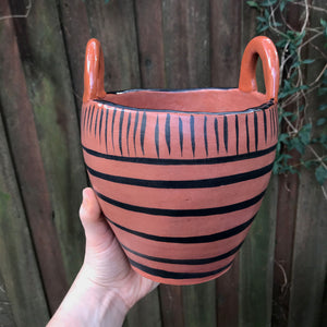 Bucket with stripes