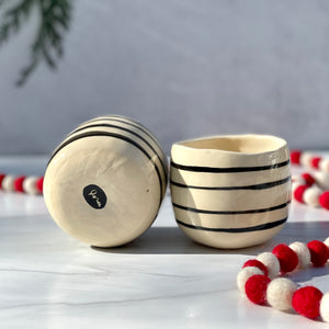 Whiskey cup with black and white stripes 1