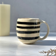 Load image into Gallery viewer, Mug with black and white stripes