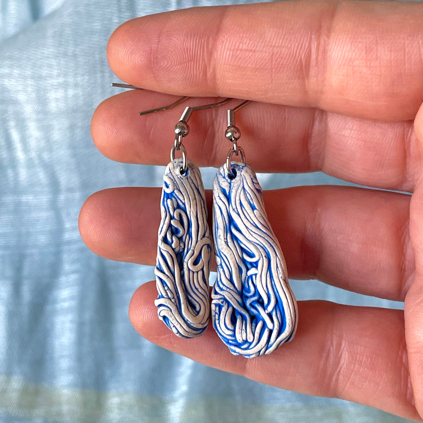 Asymmetrical Angel Hair Dangles with Blue Details