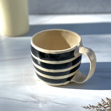 Load image into Gallery viewer, Mug with black and white stripes